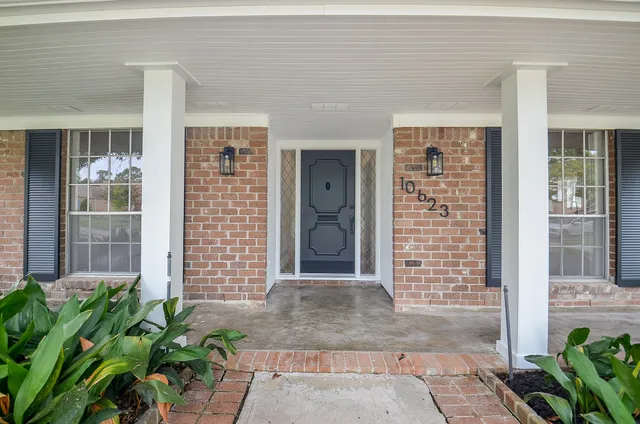 a front view of a house with a shower