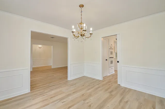 a view of a room with a large window