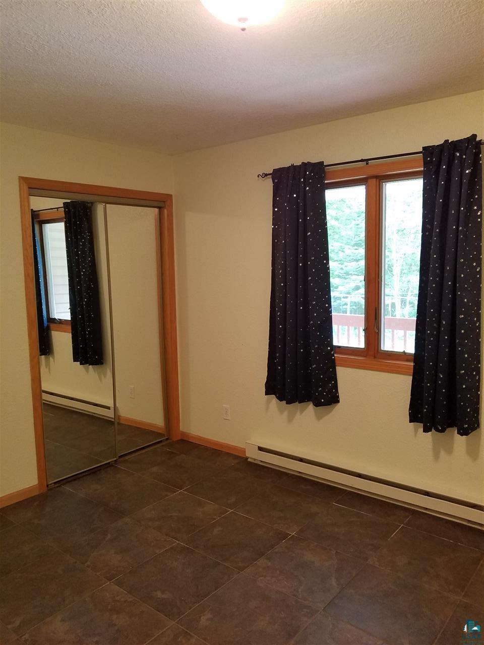 4750 Canosia Road Saginaw, MN 55779 - Photo 12 of 16 main floor bedroom