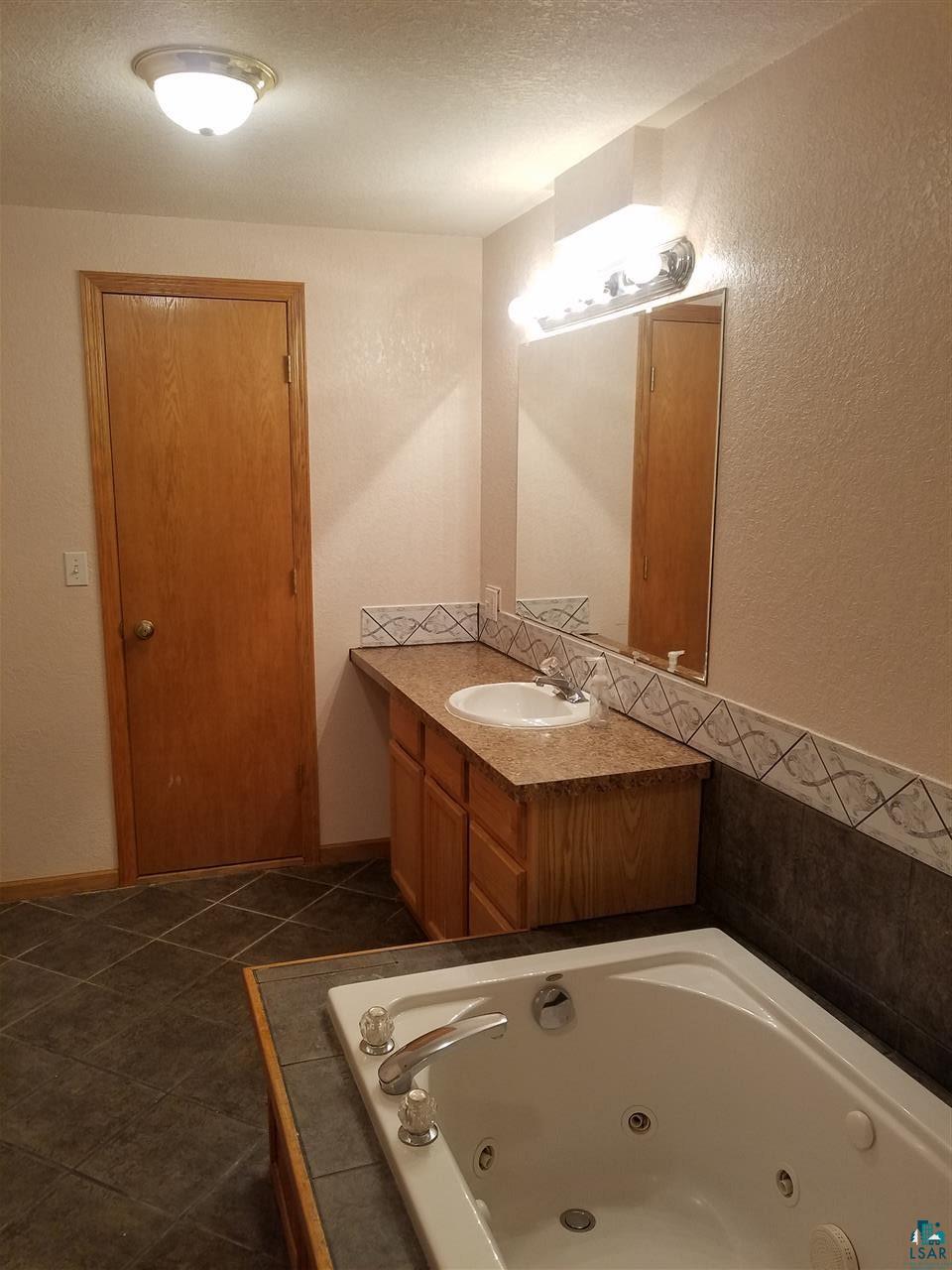 4750 Canosia Road Saginaw, MN 55779 - Photo 6 of 16 lower level bath