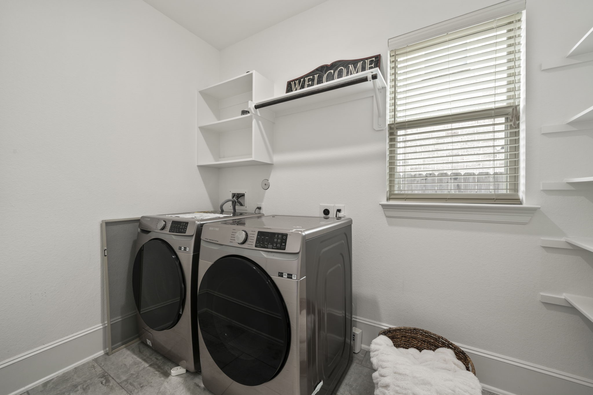 3938 Avalon Ridge Drive Spring, TX 77386 - Photo 15 of 49 Super spacious laundry room has shelving and plenty of space