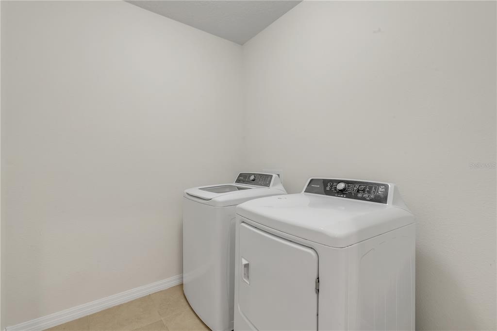 48 Hickory Loop Ocala, FL 34472 - Photo 40 of 52 a utility room with dryer and washer