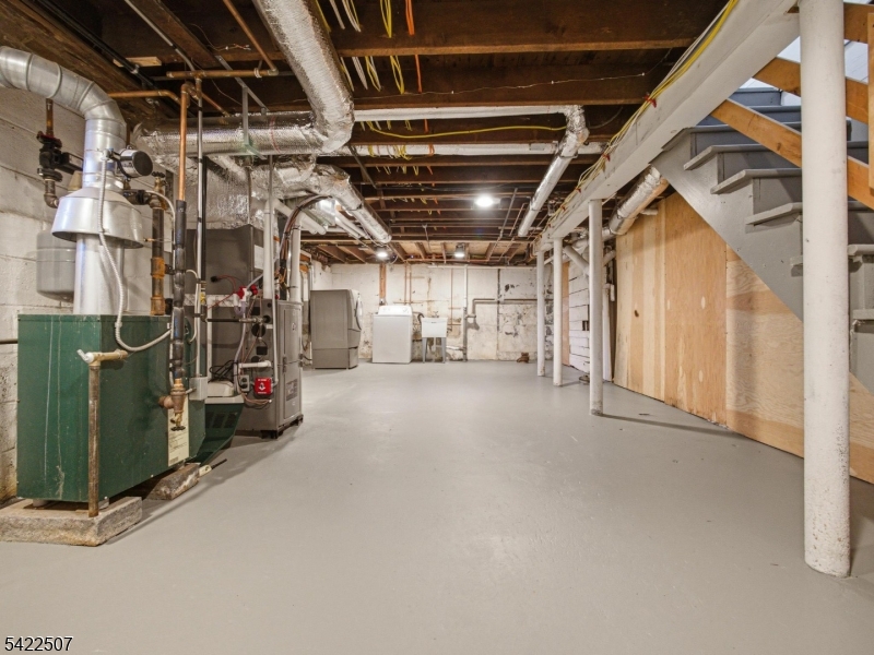 46 West End Avenue, Unit LEFT Summit, NJ 07901 - Photo 16 of 19 a view of empty room with wooden ceiling