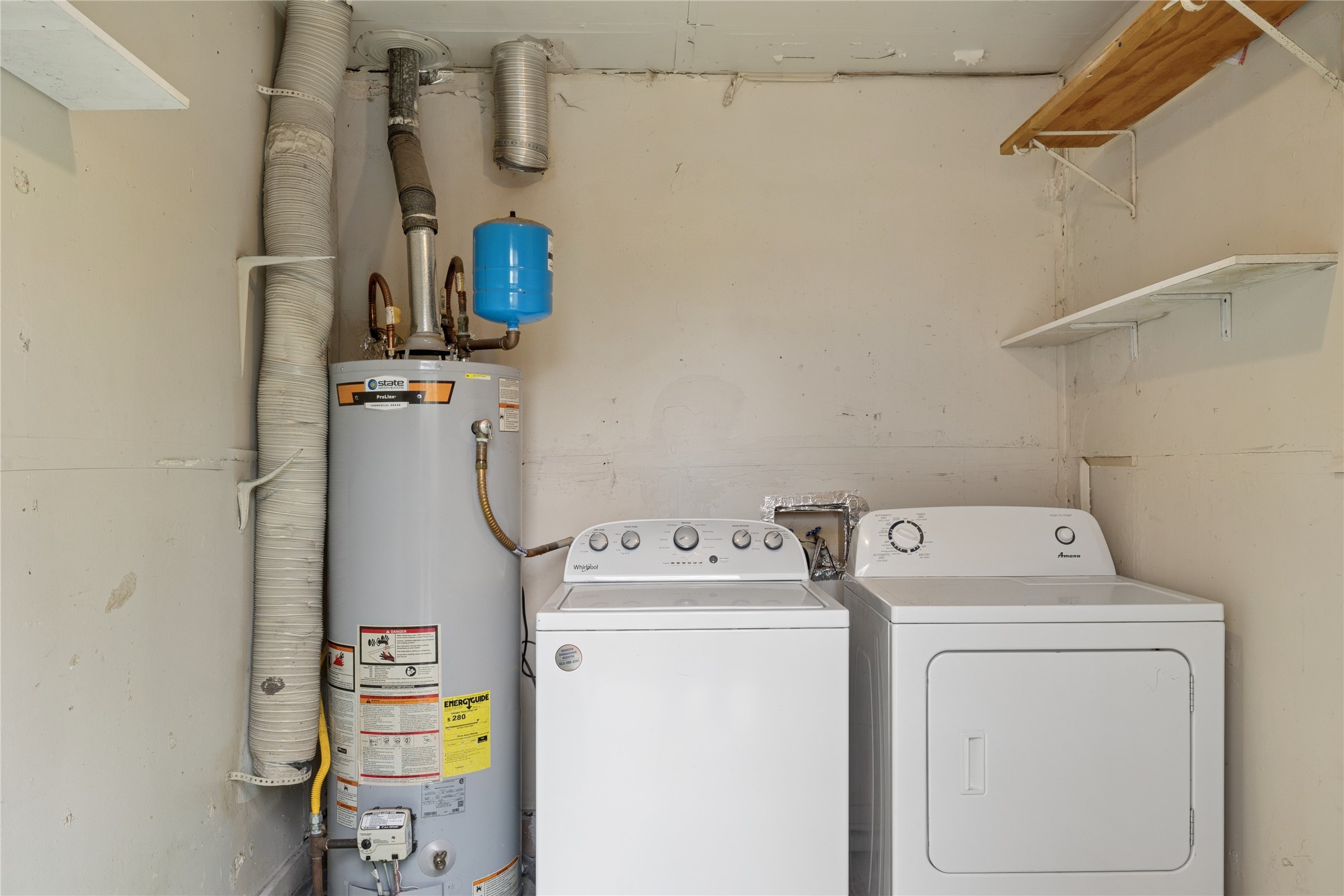 820 Sahara Avenue, Unit B Austin, TX 78745 - Photo 11 of 29 a utility room with dryer and washer
