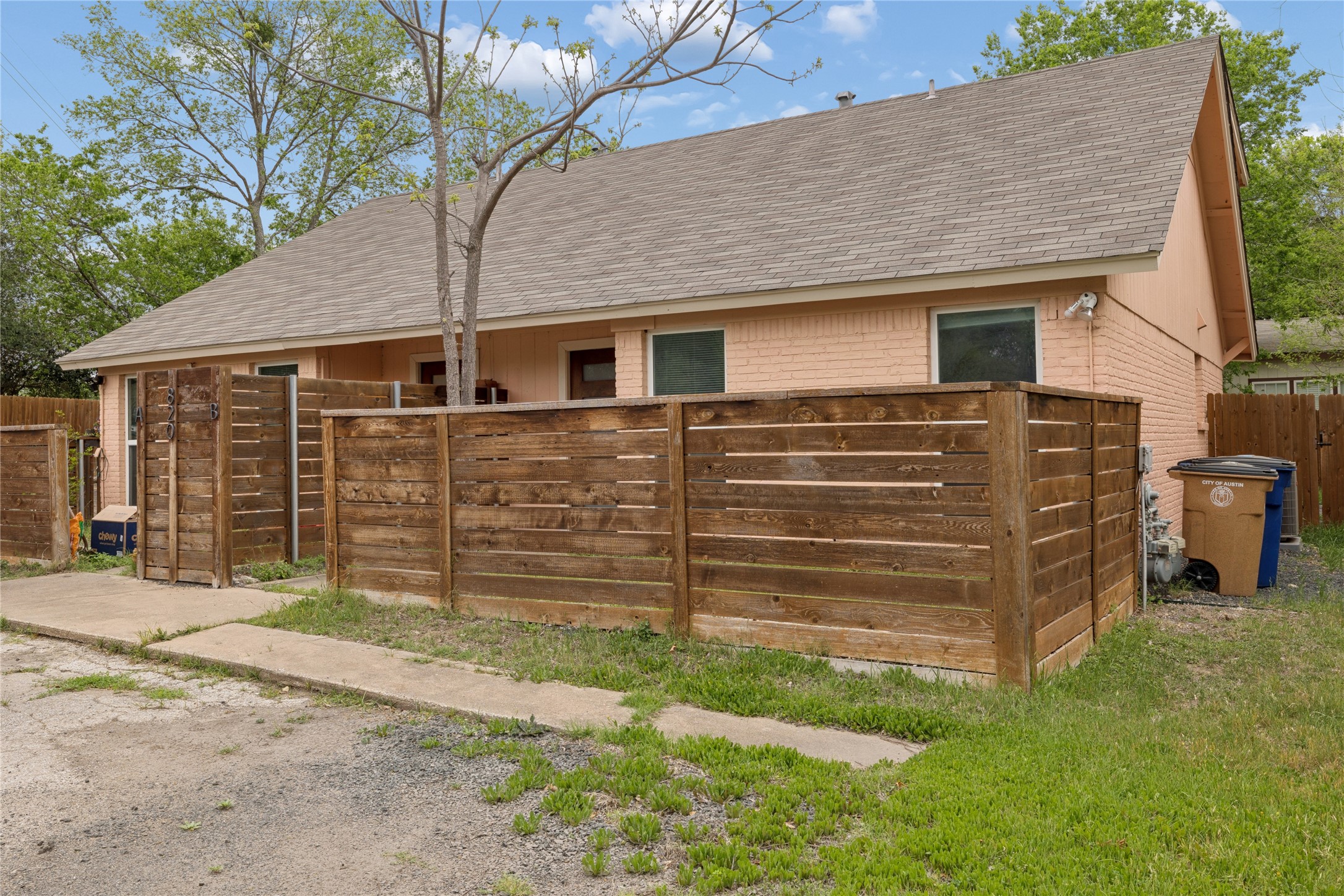 820 Sahara Avenue, Unit B Austin, TX 78745 - Photo 19 of 29 a view of a house with a yard