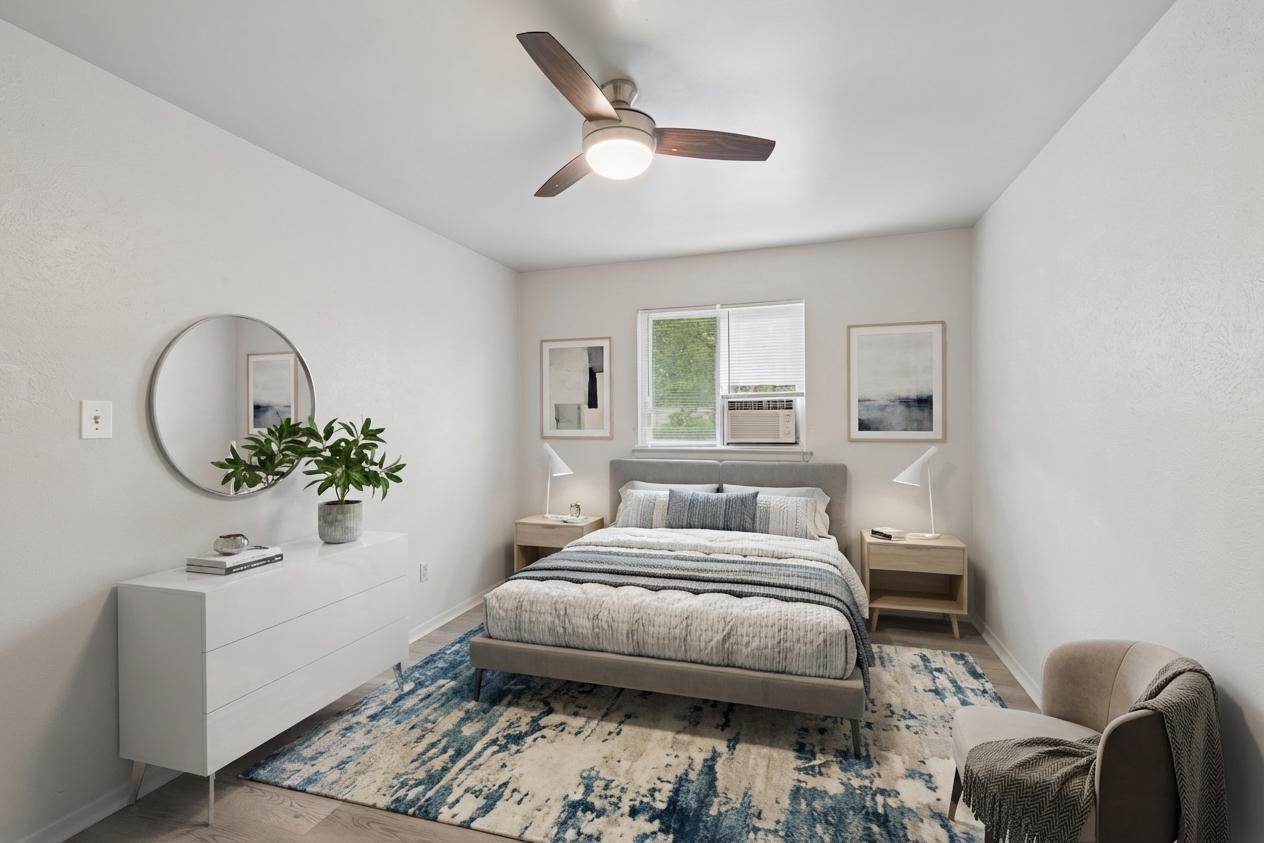 820 Sahara Avenue, Unit B Austin, TX 78745 - Photo 23 of 29 a bedroom with a bed couch and window