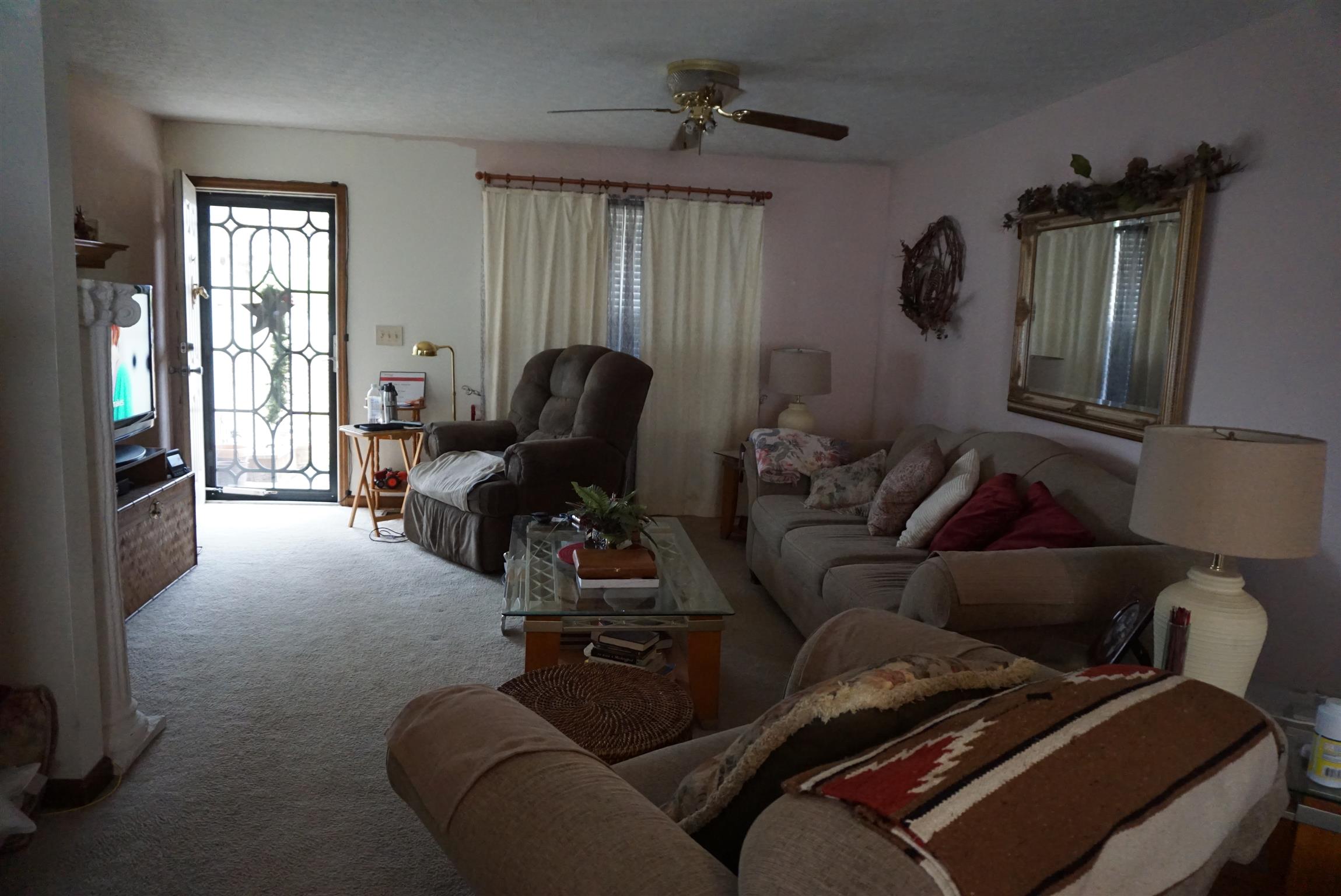 634 Butler Road Portland, TN 37148 - Photo 2 of 14 a living room with furniture and a window