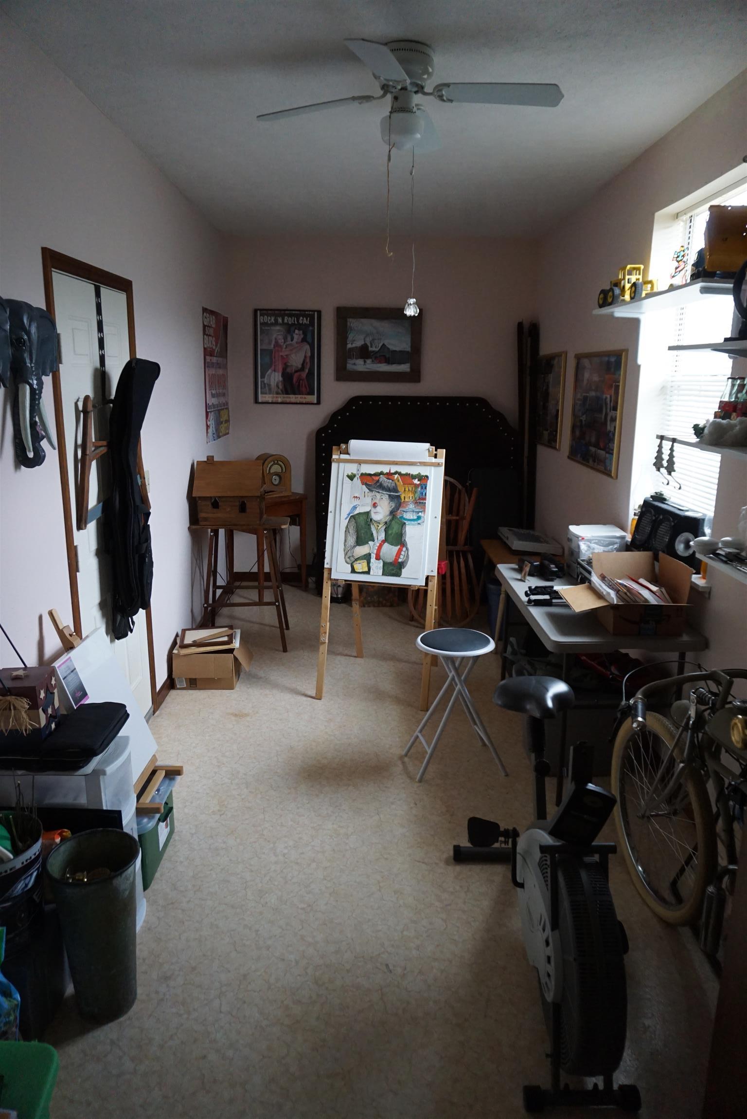 634 Butler Road Portland, TN 37148 - Photo 11 of 14 a work room with furniture and musical instruments