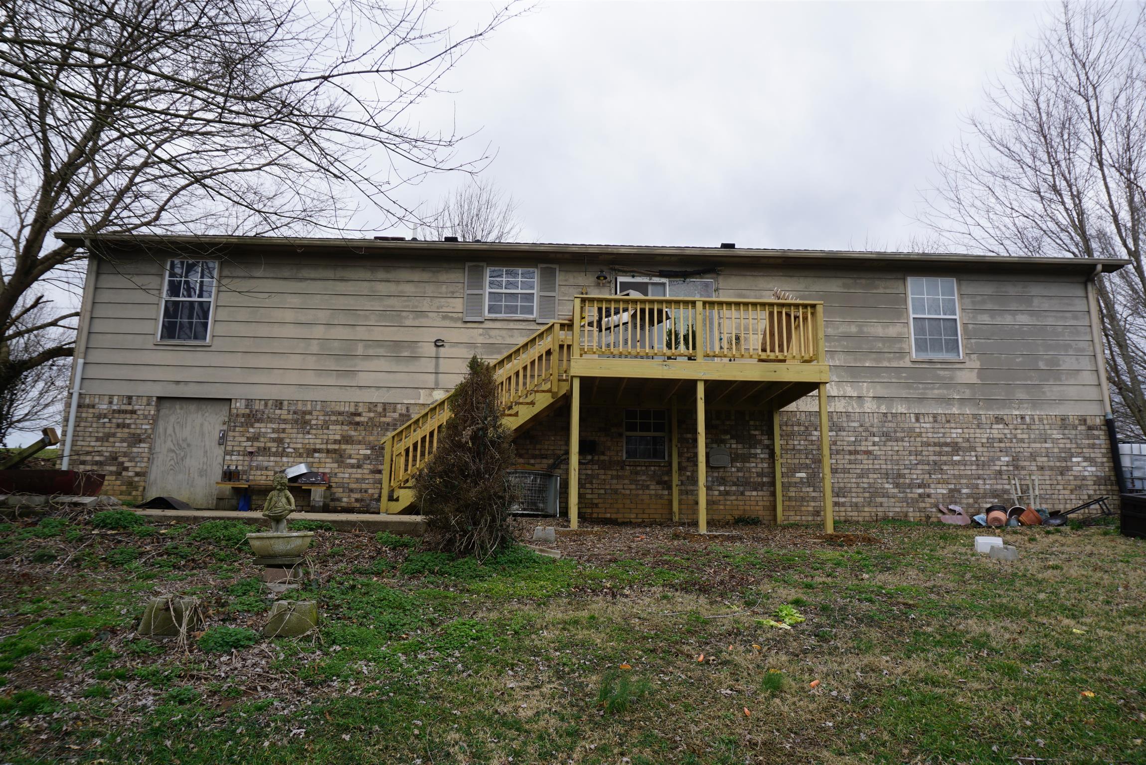 634 Butler Road Portland, TN 37148 - Photo 14 of 14 a view of a house with a backyard