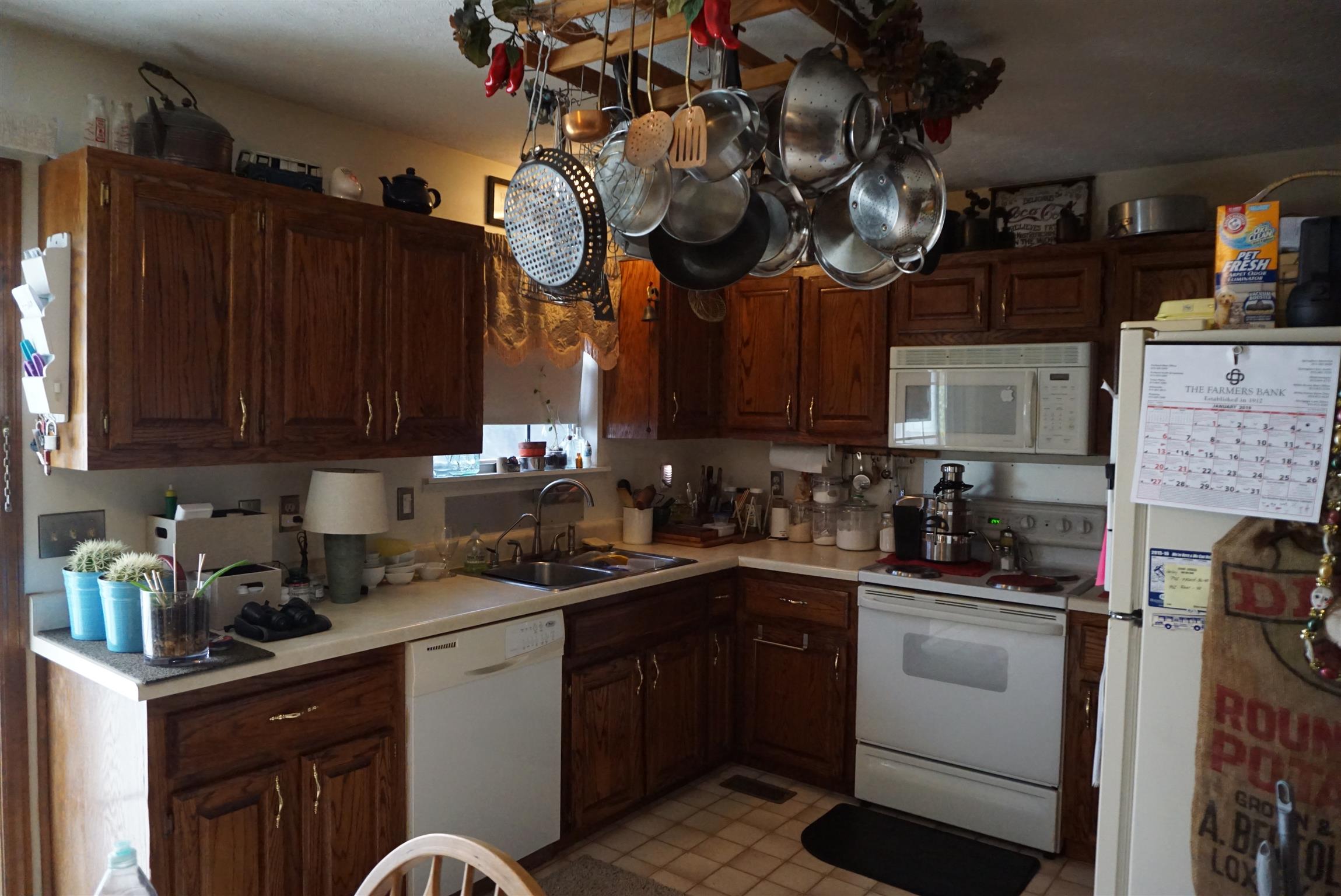 634 Butler Road Portland, TN 37148 - Photo 4 of 14 a kitchen with a sink cabinets and appliances