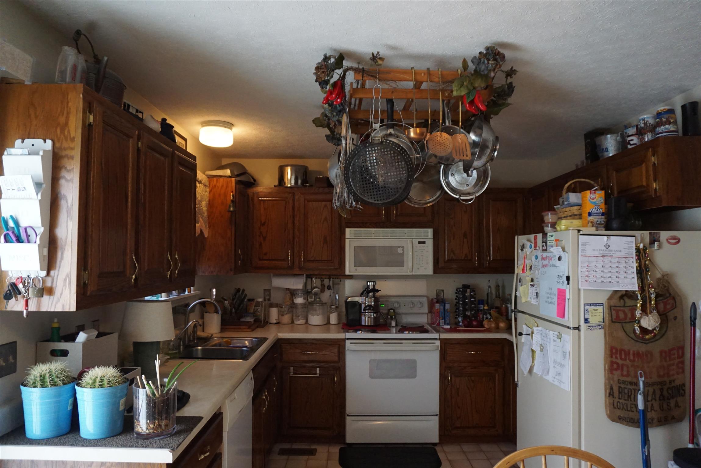 634 Butler Road Portland, TN 37148 - Photo 5 of 14 a kitchen with refrigerator and cabinets