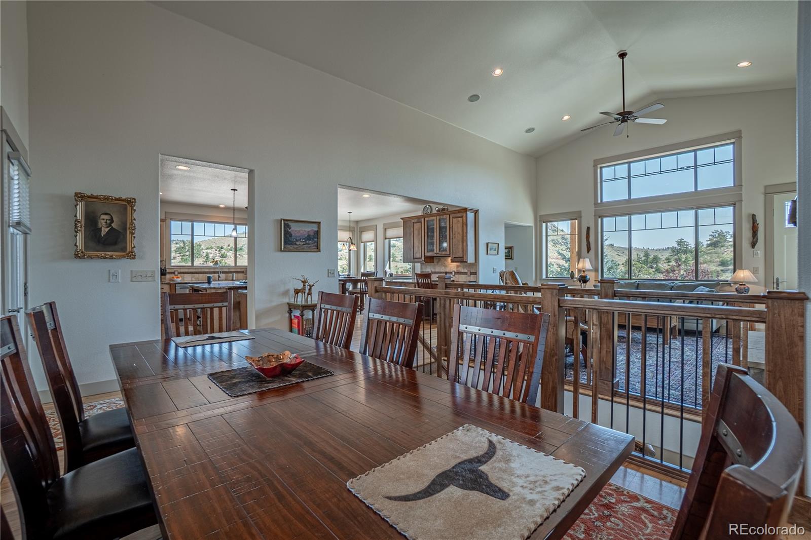 1388 Mt Moriah Road Livermore, CO 80536 - Photo 12 of 40 a living room with furniture a window and wooden floor