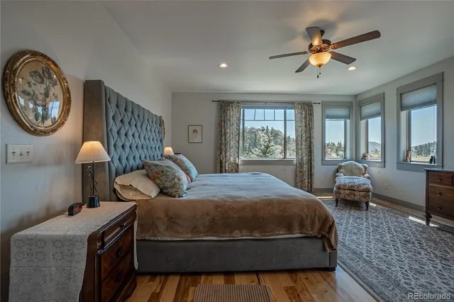 a bathroom with a sink toilet and mirror