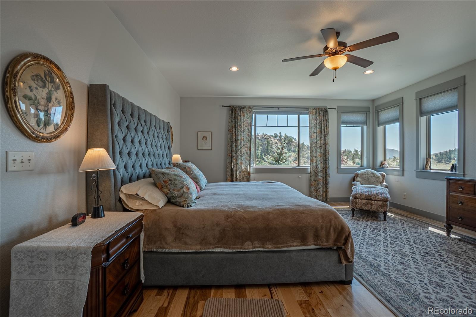 1388 Mt Moriah Road Livermore, CO 80536 - Photo 15 of 40 a bedroom with a bed and window