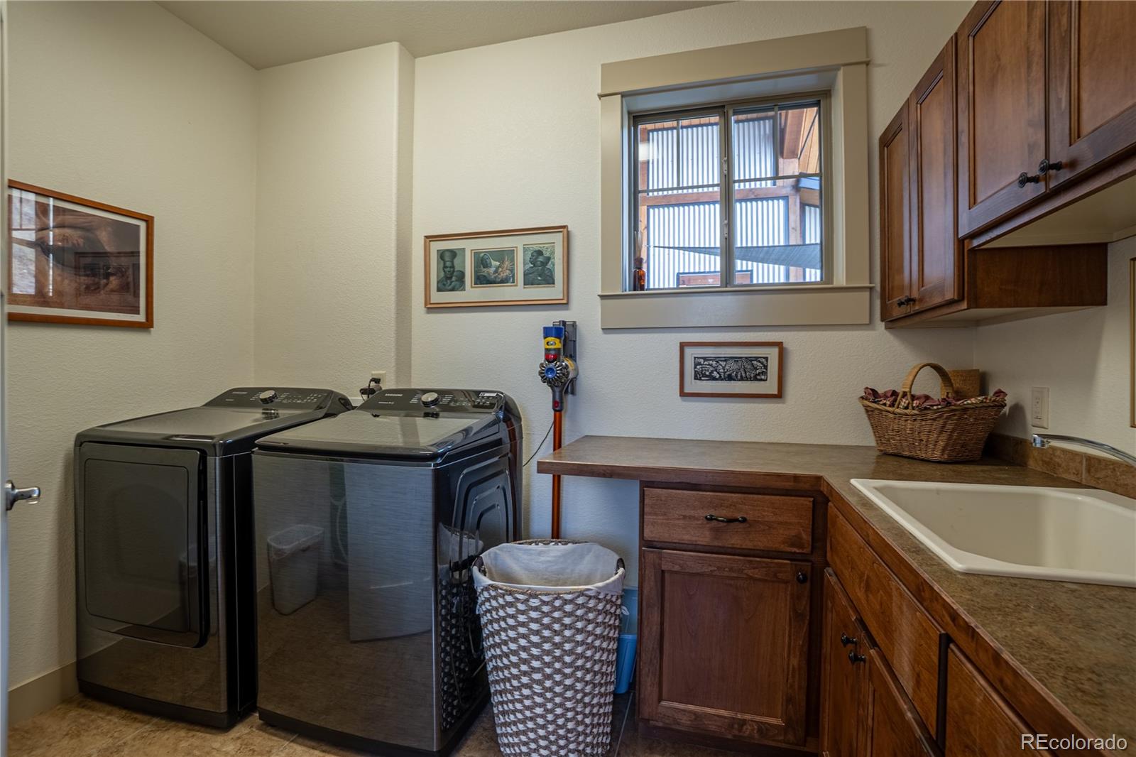 1388 Mt Moriah Road Livermore, CO 80536 - Photo 26 of 40 a kitchen with stainless steel appliances granite countertop a sink stove and cabinets