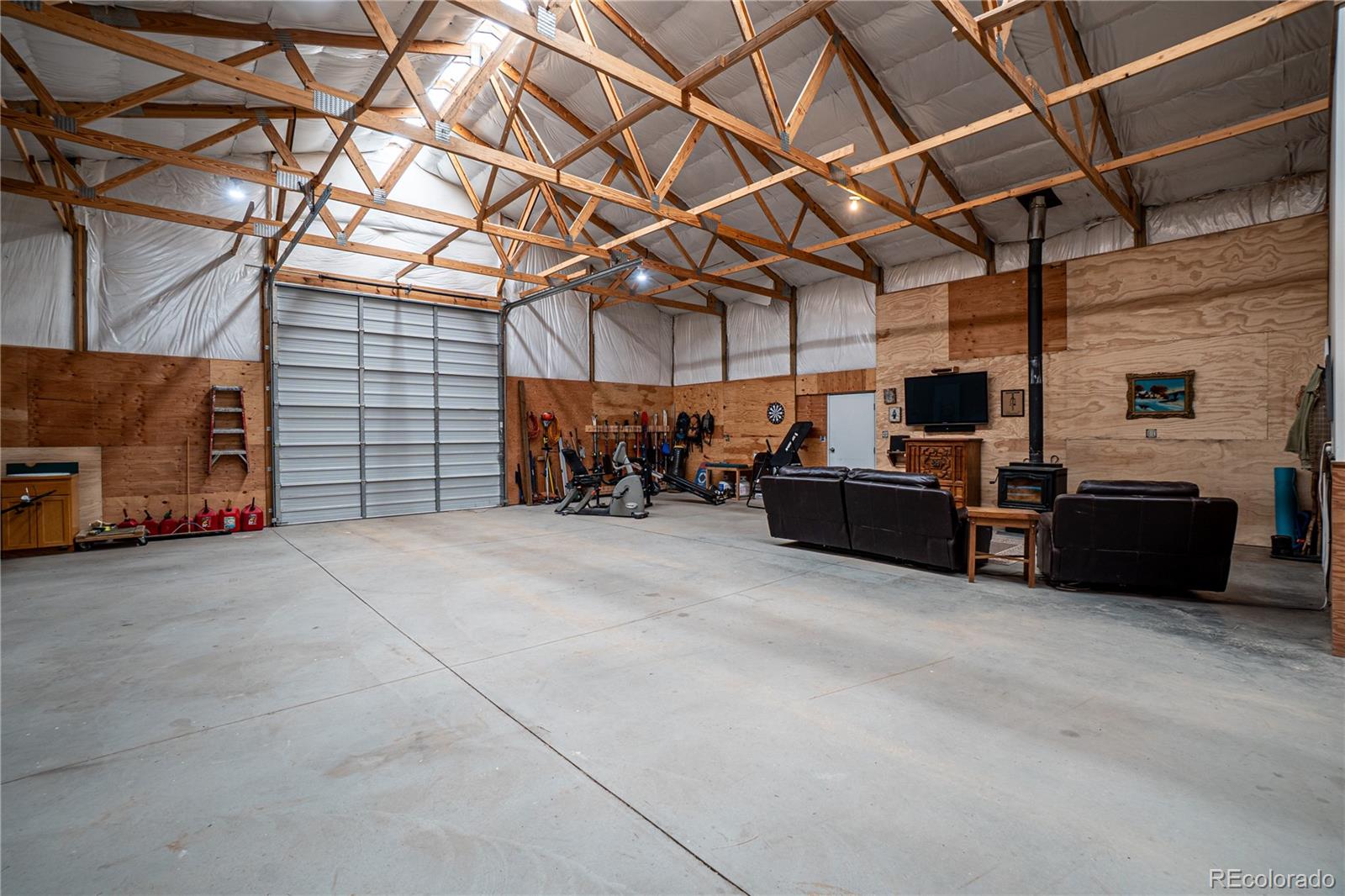 1388 Mt Moriah Road Livermore, CO 80536 - Photo 37 of 40 a view of a garage with furniture