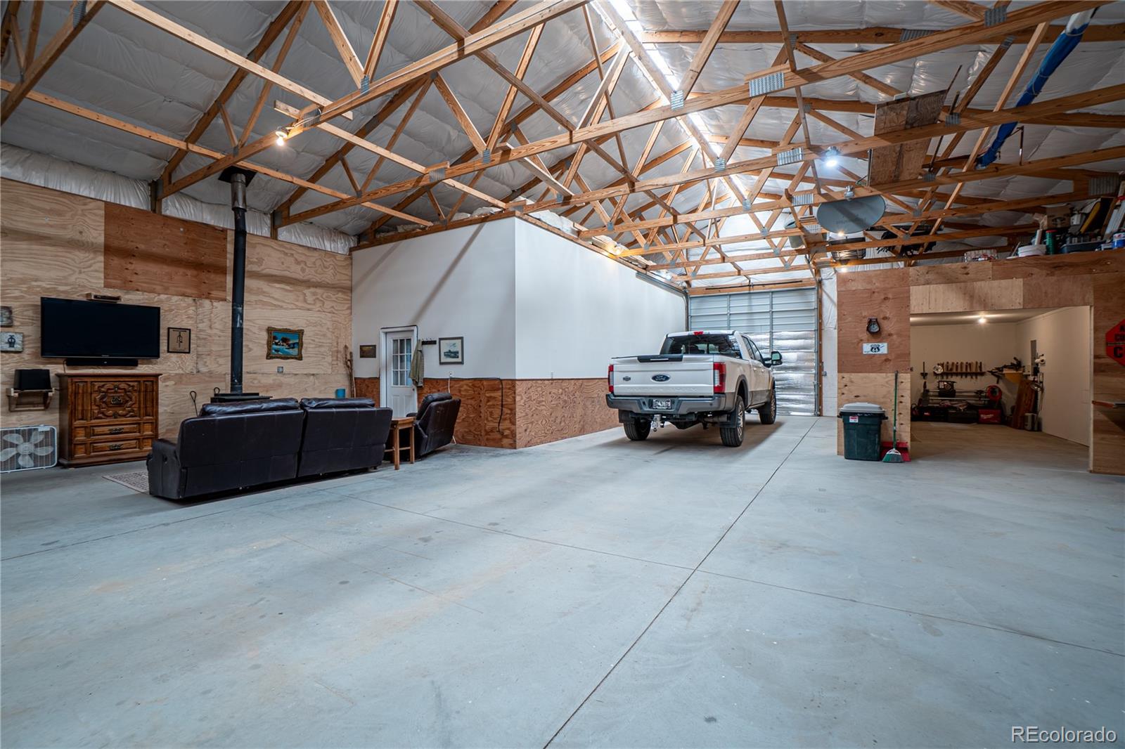 1388 Mt Moriah Road Livermore, CO 80536 - Photo 38 of 40 a car parked in garage