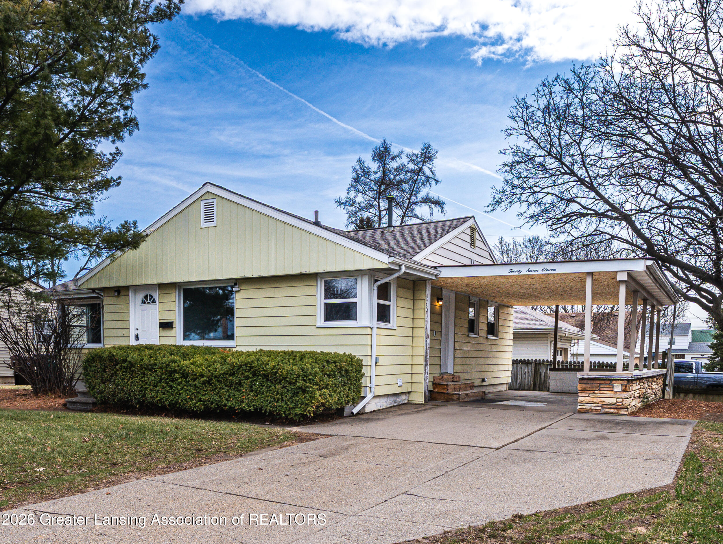 2711 Pleasant Grove Road Lansing, MI 48910 - Photo 30 of 31 Front