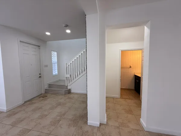 a view of entryway with stairs