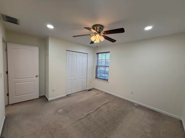 a bathroom with a sink a toilet and bathtub