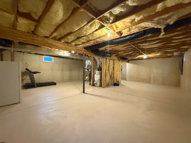 a view of a garage with red door