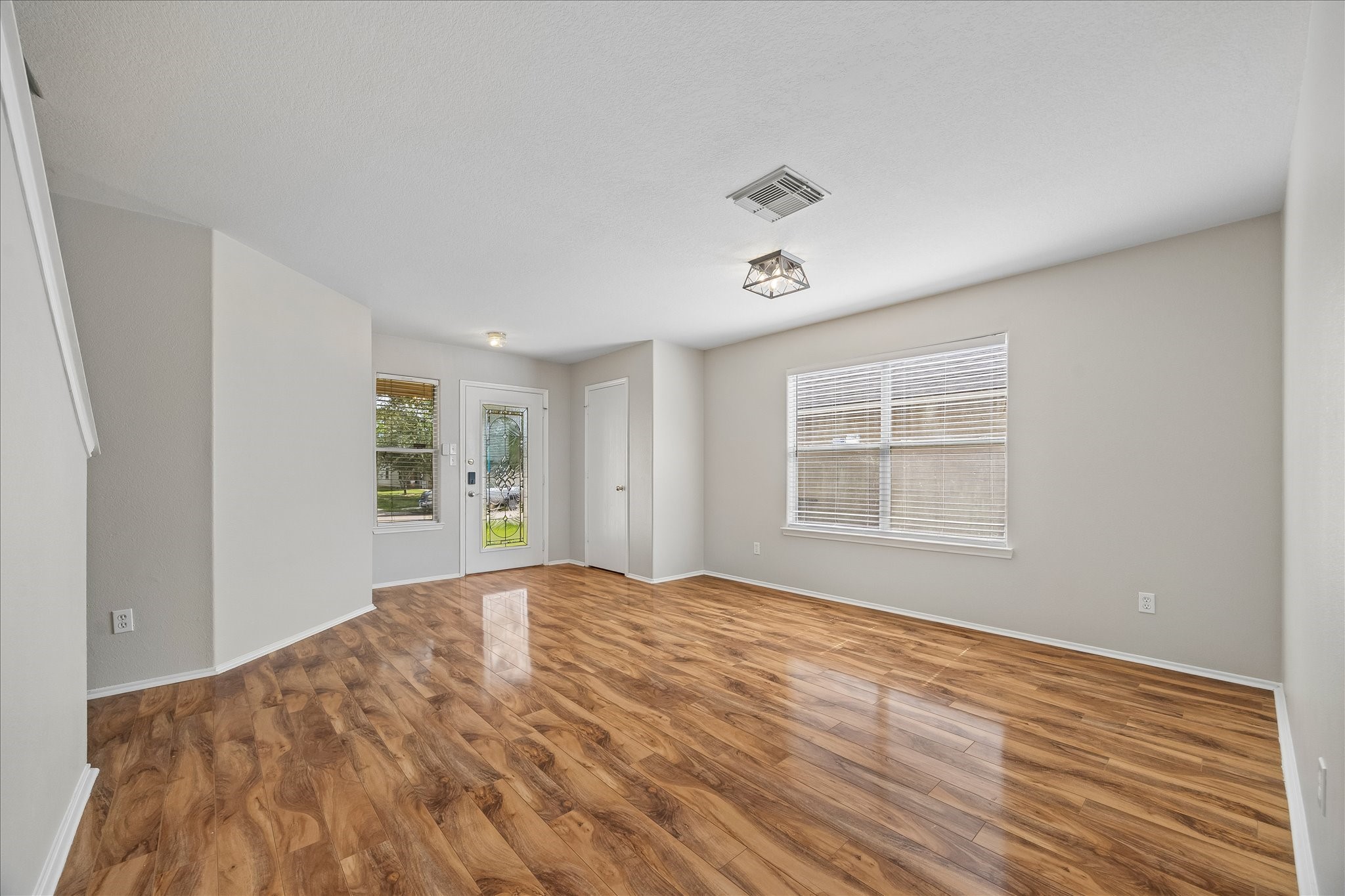 223 Sunset Colony Drive Rosharon, TX 77583 - Photo 50 of 50 Step inside to fresh, inviting interiors where laminate flooring and a light neutral palette set the tone for a flexible floor plan designed to fit the way you live.