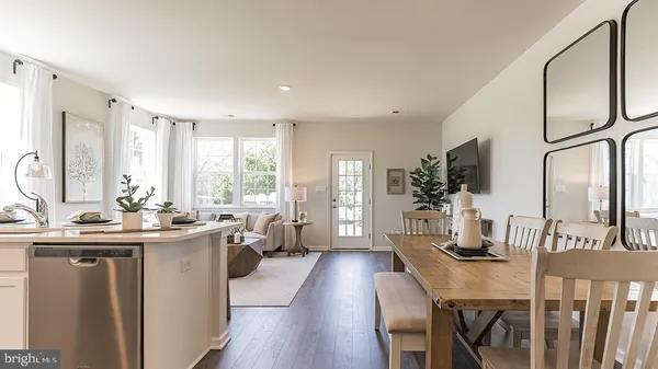 a kitchen with sink a counter top space and appliances