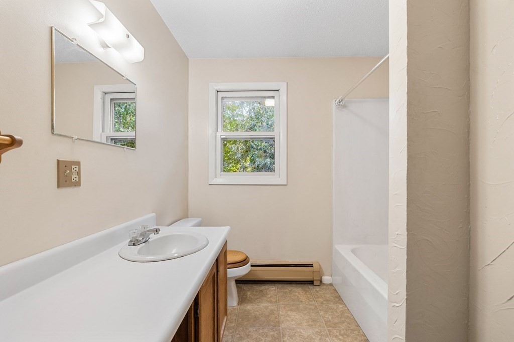 756 Bemis Road Warren, MA 01585 - Photo 31 of 41 a bathroom with a sink and a mirror