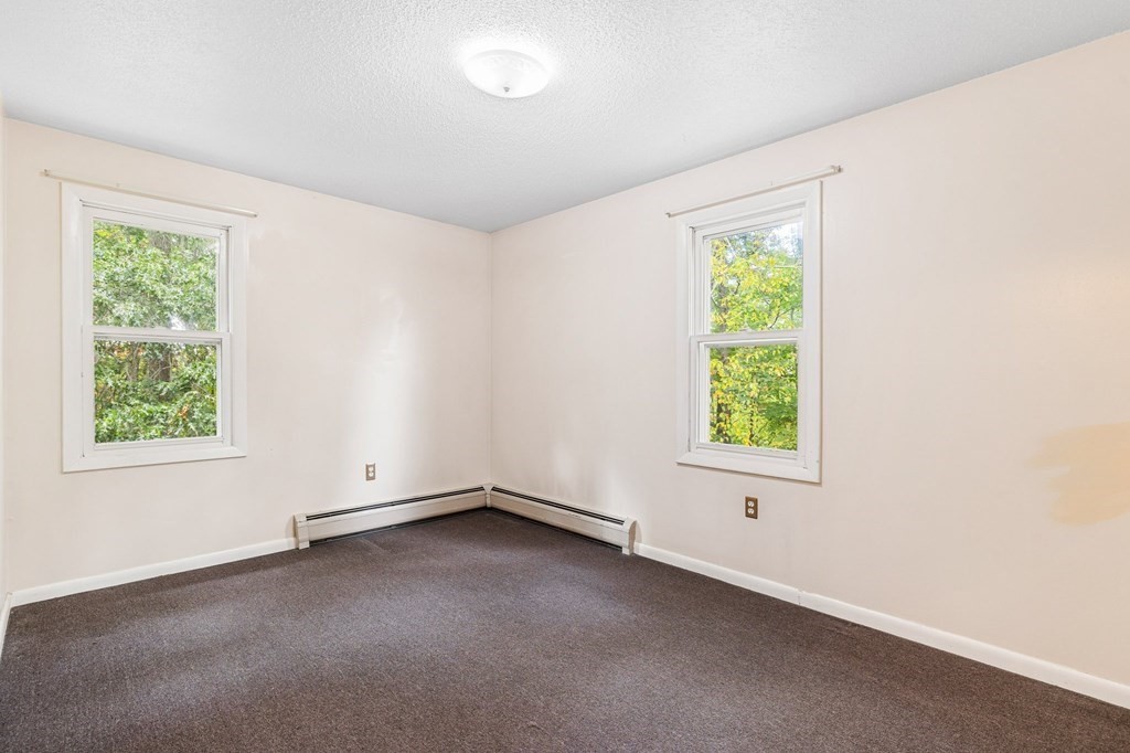 756 Bemis Road Warren, MA 01585 - Photo 33 of 41 an empty room with a window