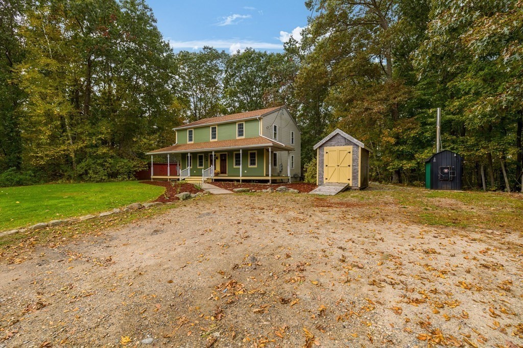 756 Bemis Road Warren, MA 01585 - Photo 37 of 41 a view of a house with a yard