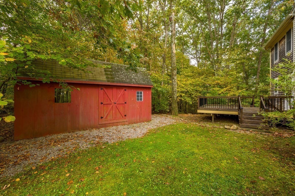 756 Bemis Road Warren, MA 01585 - Photo 41 of 41 a backyard of a house with yard and outdoor seating
