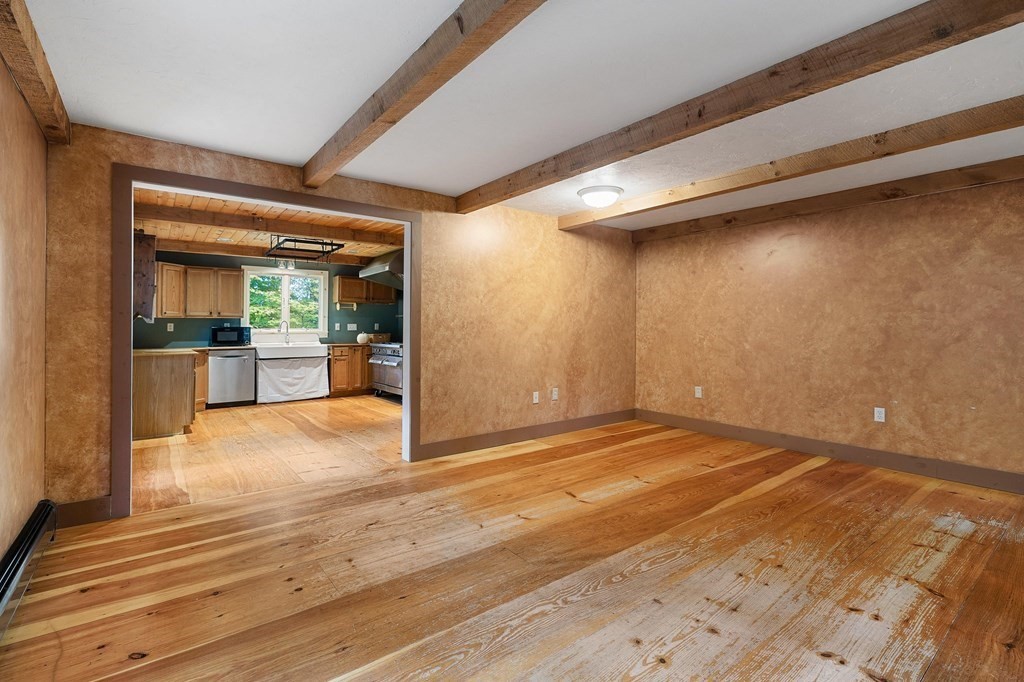 756 Bemis Road Warren, MA 01585 - Photo 6 of 41 a view of empty room with wooden floor