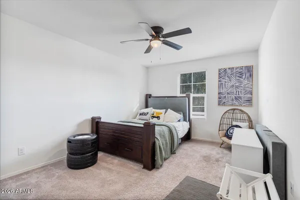 a room with gym equipment and windows