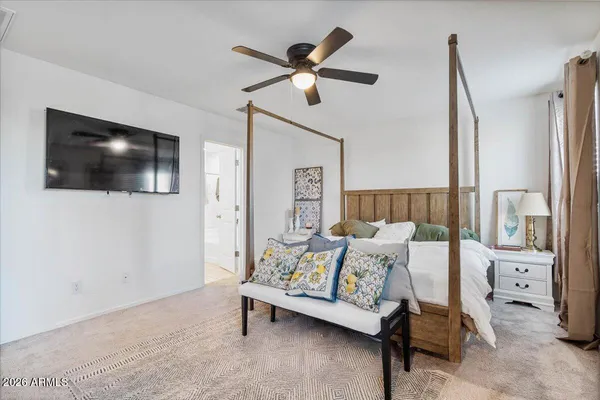 a room with a table and chairs