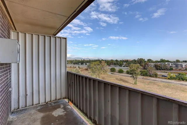 a view of a balcony with city view