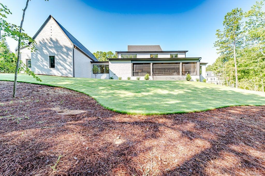 1008 Welch Lane Raleigh, NC 27614 - Photo 30 of 46 a view of a house with backyard