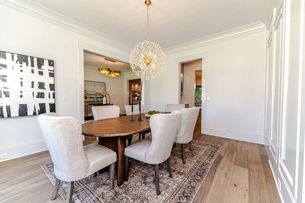 1008 Welch Lane Raleigh, NC 27614 - Photo 5 of 46 a view of a dining room with furniture and chandelier