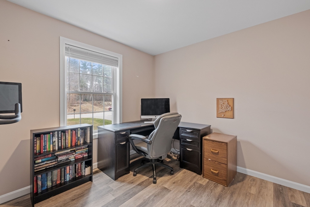 3 Fieldstone Drive Deerfield, NH 03037 - Photo 14 of 28 a view of a workspace with furniture and a window