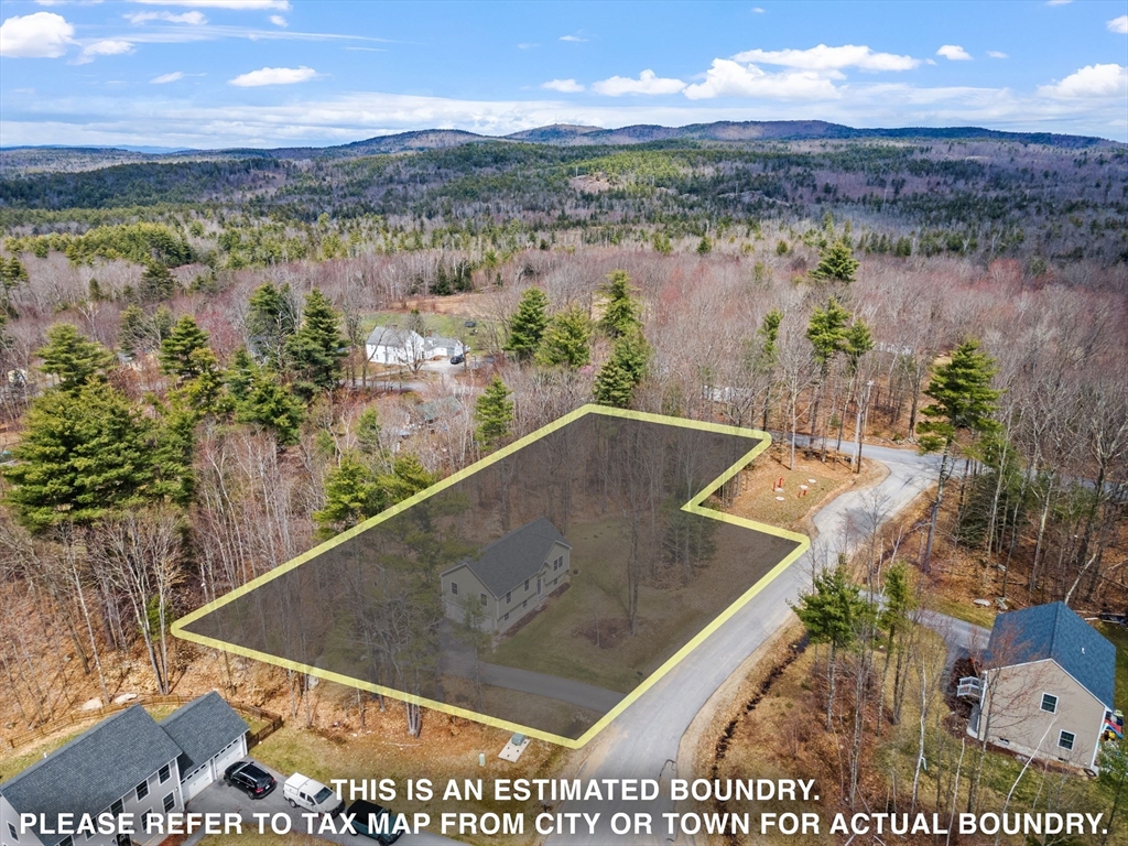 3 Fieldstone Drive Deerfield, NH 03037 - Photo 2 of 28 a view of a lake from a balcony