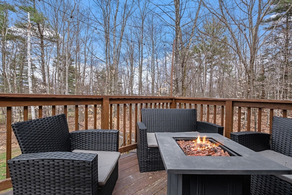 3 Fieldstone Drive Deerfield, NH 03037 - Photo 22 of 28 a view of a city from a balcony