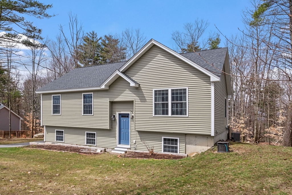 3 Fieldstone Drive Deerfield, NH 03037 - Photo 4 of 28 a view of a house with a yard