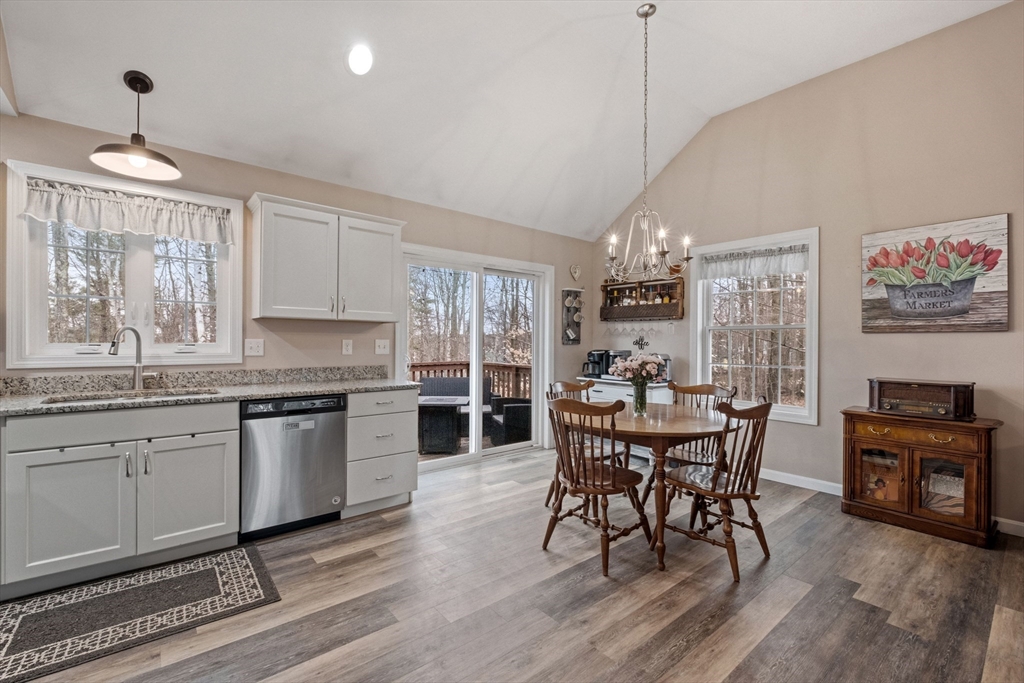 3 Fieldstone Drive Deerfield, NH 03037 - Photo 7 of 28 a view of a dining room with furniture window and wooden floor