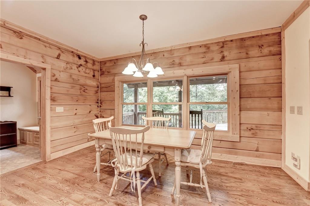 82 Walnut Grove Lane Tiger, GA 30576 - Photo 23 of 88 a view of a dining room with furniture window and wooden floor
