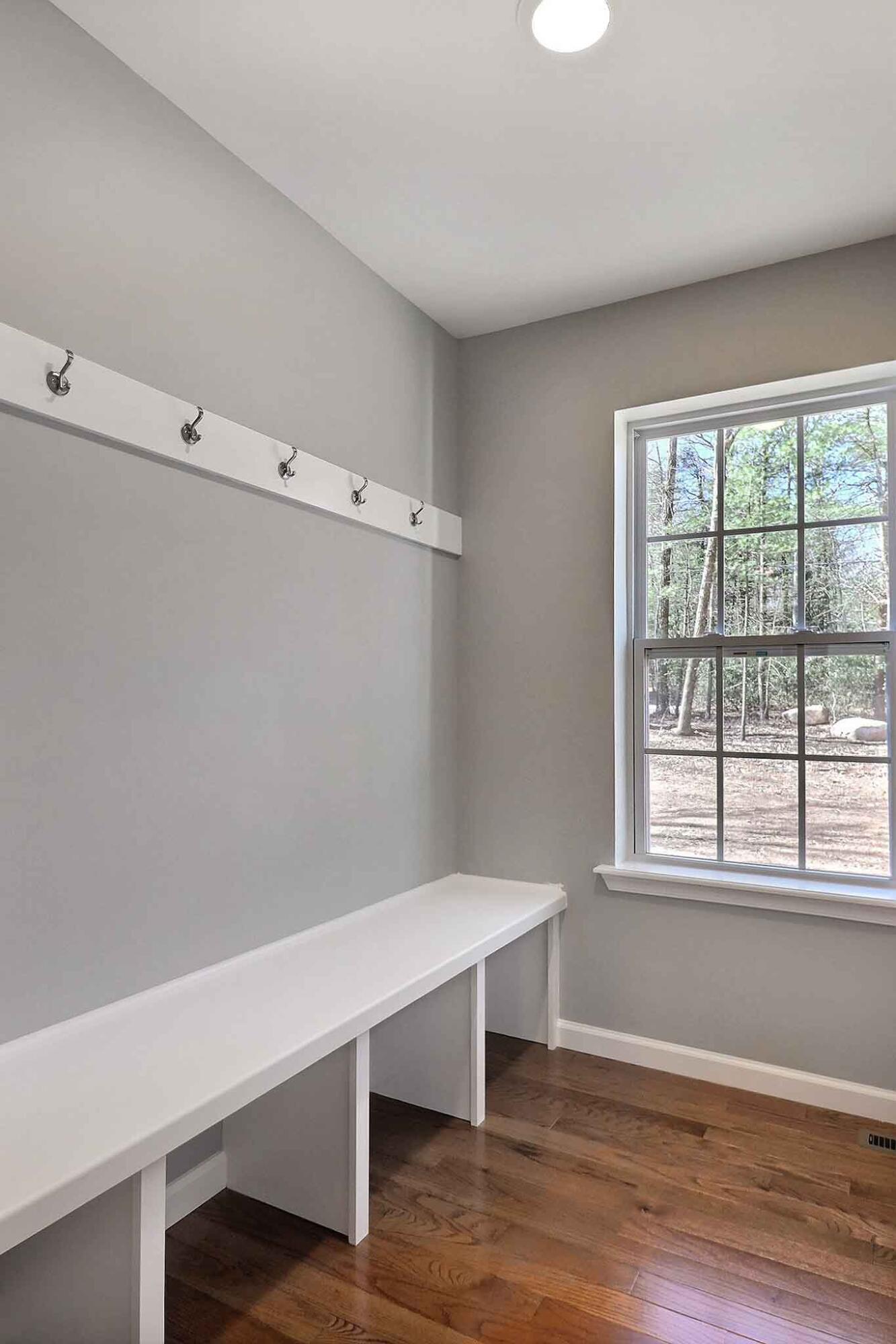 552 Long Mountain Road Effort, PA 18330 - Photo 20 of 47 a view of an empty room with wooden floor and window