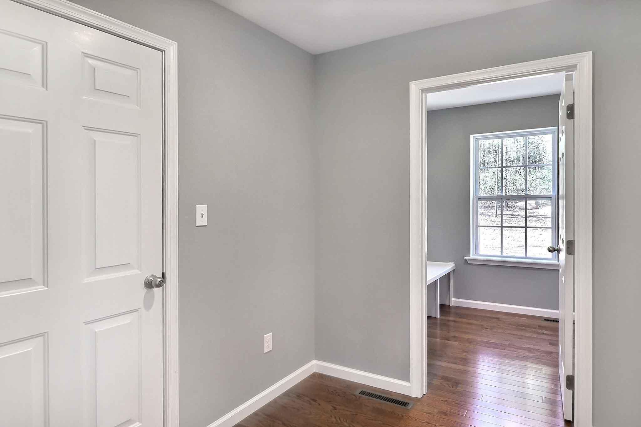 552 Long Mountain Road Effort, PA 18330 - Photo 23 of 47 an empty room with wooden floor closet and windows