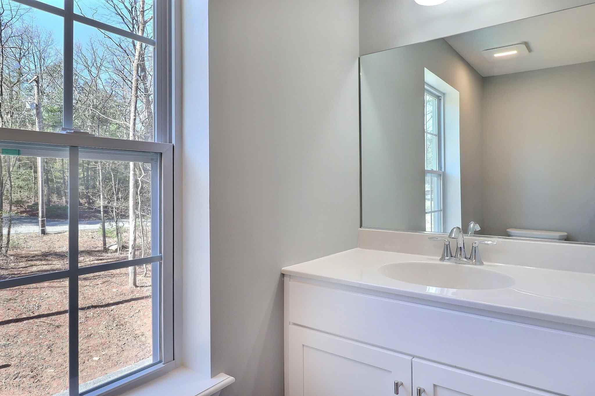 552 Long Mountain Road Effort, PA 18330 - Photo 33 of 47 a bathroom with a sink and a mirror
