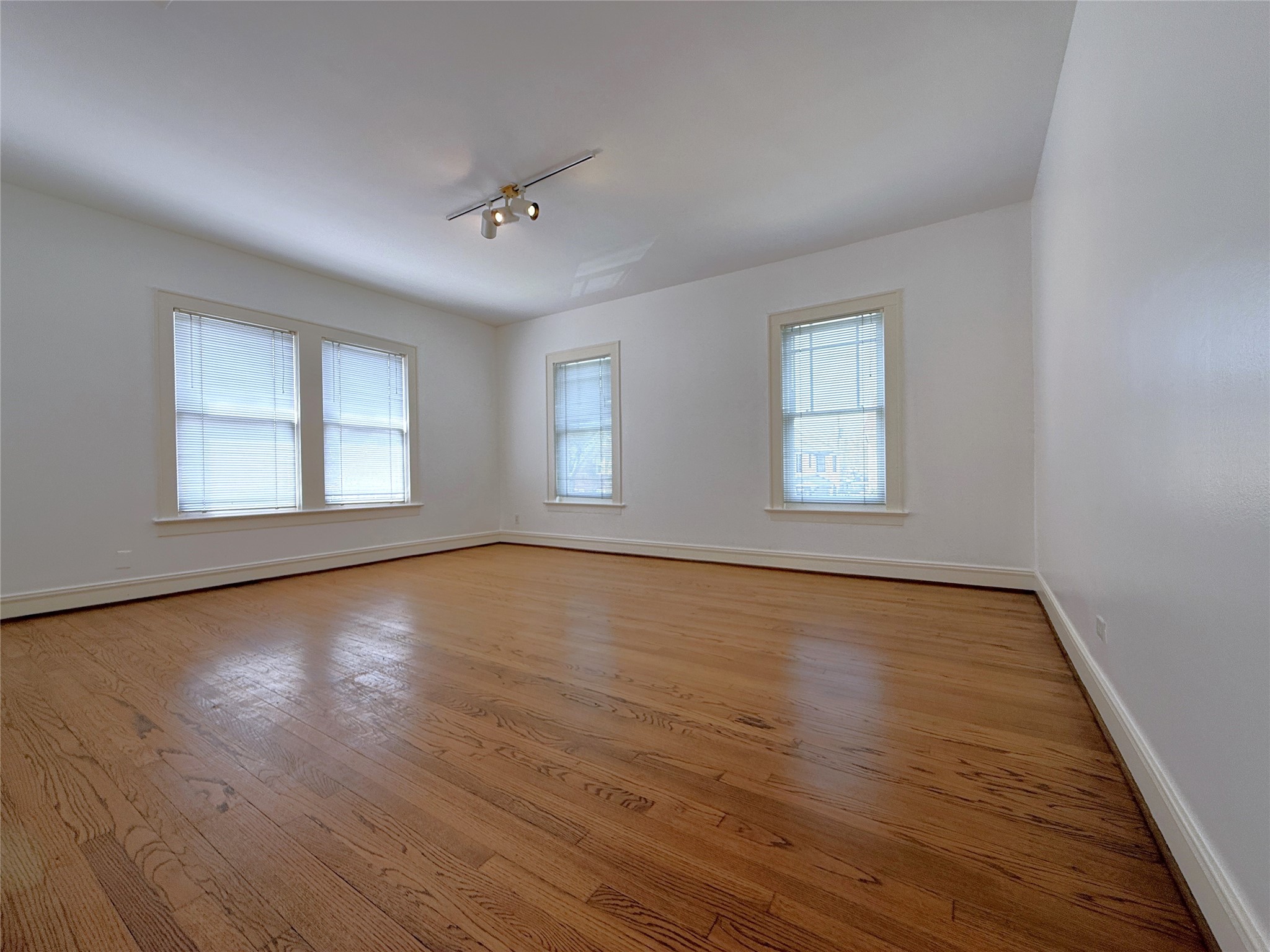 2311 Wroxton Road Houston, TX 77005 - Photo 8 of 24 The formal dining room, could be utilized as a home office.