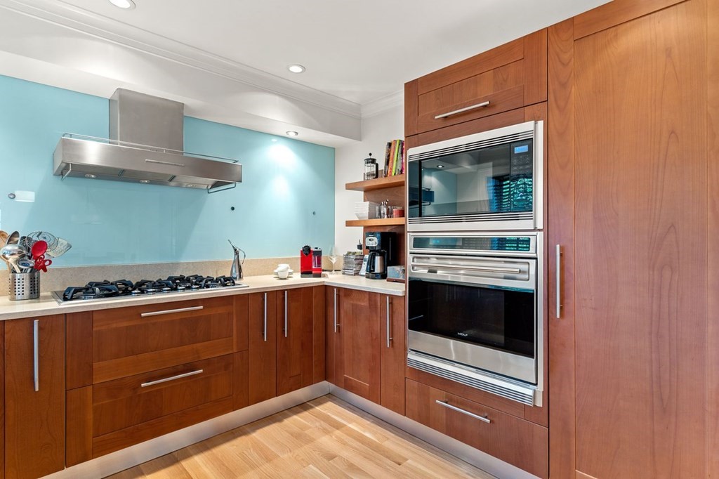22 Robert Road Marblehead, MA 01945 - Photo 11 of 41 a kitchen with stainless steel appliances granite countertop a stove and a sink