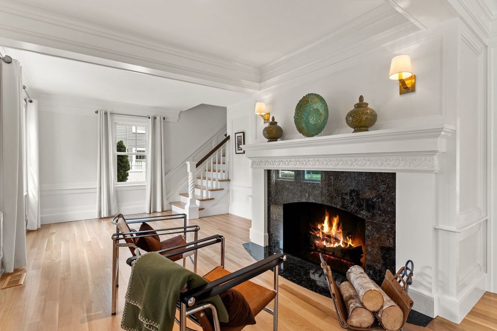 22 Robert Road Marblehead, MA 01945 - Photo 16 of 41 a living room with furniture and a fireplace