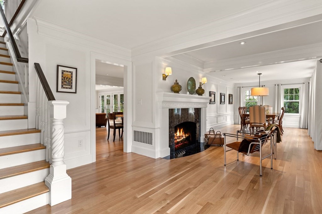 22 Robert Road Marblehead, MA 01945 - Photo 17 of 41 a living room with furniture and a fireplace